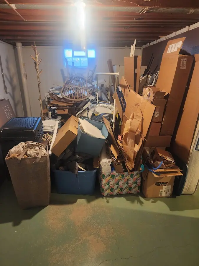 Roll-off dumpster container at job site for Yard Waste Dumpster Rental in Ocean Pines